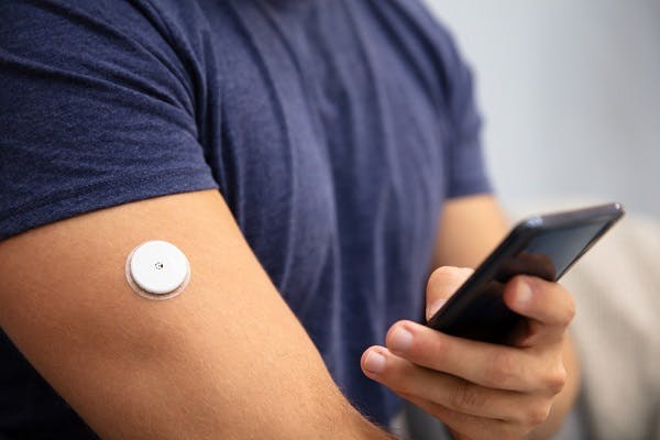 Drug delivery wearable insulin device with polymer